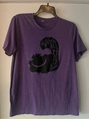 Purple Cheshire Cat Graphic Tee
"Were all mad here" Large?